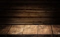 Old wooden tabletop and wooden wall at the background Royalty Free Stock Photo