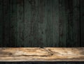 Old wooden tabletop and wooden wall at the background Royalty Free Stock Photo