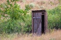 Old wooden toilet Camping in a village Royalty Free Stock Photo