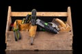 Old wooden tool box. Various DIY accessories on a workbench Royalty Free Stock Photo