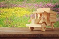 old wooden toy truck car over wooden table Royalty Free Stock Photo