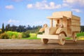 old wooden toy truck car over wooden table Royalty Free Stock Photo