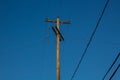 Old wooden traditional electric wire pole Royalty Free Stock Photo