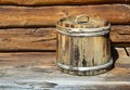 old wooden tub with lid. container made of wooden planks and covered with hoops. vintage barrel for products Royalty Free Stock Photo