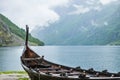 Old wooden viking boat in norwegian nature