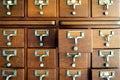 Old wooden vintage Medicine drawer cabinet. Catalog file cabinet. Royalty Free Stock Photo