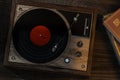 The old wooden vinyl record player on the table, 3d rendering Royalty Free Stock Photo