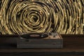 The old wooden vinyl record player on the table, 3d rendering Royalty Free Stock Photo