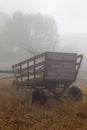 Old wooden wagon in fog Royalty Free Stock Photo