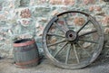 Old wooden wagon wheel and barrel Royalty Free Stock Photo