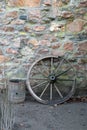 Old wooden wagon wheel and barrel Royalty Free Stock Photo