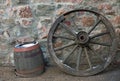 Old wooden wagon wheel and barrel Royalty Free Stock Photo