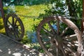 Old wooden wagon wheels beside lake Royalty Free Stock Photo