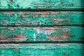 old wooden wall peeling green paint