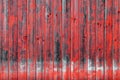 Old wooden wall with red paint. Wooden background with texture amazing texture and chaotic color pattern. Aged from time Royalty Free Stock Photo