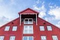 Old wooden warehousesalong the harbor in the center of Tromso in Royalty Free Stock Photo