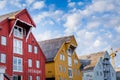 Old wooden warehousesalong the harbor in the center of Tromso in Royalty Free Stock Photo