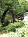 Old water wheel on river