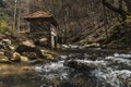 Old Wooden Watermill at River in Forest Royalty Free Stock Photo