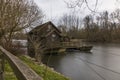 Old wooden watermill on river in Slovenia Royalty Free Stock Photo