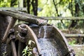 Old wooden waterwheel in the forest Royalty Free Stock Photo