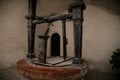 Old wooden well at historic Hohensalzburg fortress, water well forged in a rock in a medieval castle, characteristic point of the Royalty Free Stock Photo