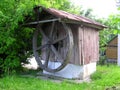 old wooden well in the village Royalty Free Stock Photo