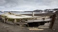 Old wooden whaling boat on the beach at Whaler`s Bay, Antarctica