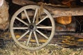 The old wooden wheel from the carriage hangs on the wall of the Ukrainian bar Royalty Free Stock Photo