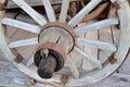 Old wooden wheel from cart in barn Royalty Free Stock Photo