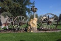 Old wooden wheel wagon as a yard decoration Royalty Free Stock Photo