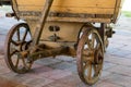 Old wooden wheels for horse cart. Open-air museum where various
