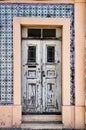 Old wooden white door with wrought iron details Royalty Free Stock Photo