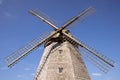 Old wooden wind mill in Lazdininkai village, DarbÃânai, Lithuania on a sunny day. Royalty Free Stock Photo