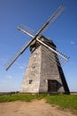 Old wooden wind mill in Lazdininkai village, DarbÃânai, Lithuania on a sunny day photographed with a drone. Royalty Free Stock Photo