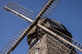 Old wooden wind mill in Lazdininkai village, DarbÃânai, Lithuania on a sunny day photographed with a drone. Royalty Free Stock Photo