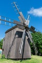 Old wooden windmill in Open-air Museum of Folk Architecture and Folkways of Ukraine in Pyrohiv Pirogovo Kiev, Ukraine Royalty Free Stock Photo