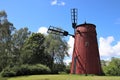 Old wooden windmill in a park Royalty Free Stock Photo