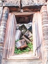 Old wooden window against rock background Royalty Free Stock Photo