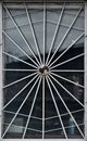 Old wooden window behind a metal grate. Vintage texture Royalty Free Stock Photo