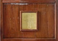 The old wooden window of the church confession cabinet