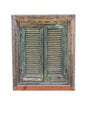 Old wooden window with closed green attice shutters. Vertical. Isolated on a white background Royalty Free Stock Photo