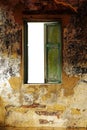 Old wooden window frame in cement wall the house interior vintage stly. Royalty Free Stock Photo