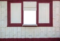 Old wooden window frame on wood wall with empty white Royalty Free Stock Photo