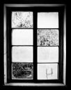 Old wooden window missing some pieces of glass. Royalty Free Stock Photo
