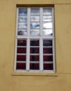 Old wooden window on old Russian-comunist type style building Royalty Free Stock Photo