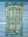 Old wooden window. Old window with closed wooden shutters. Shabby wooden shutters Royalty Free Stock Photo