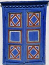 The old wooden window painted in blue