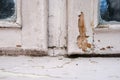 Old wooden window with peeling paint and durt needed to be repaired or replaced Royalty Free Stock Photo