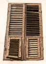 Old wooden window with shutters Royalty Free Stock Photo